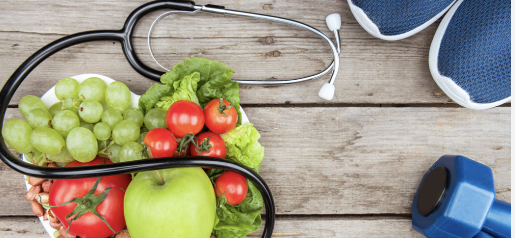 fruits and vegetables with weights, tennis shoes and stethescope